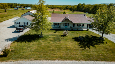 Country Home with Shops on 3.3 Acres Near Cameron, MO