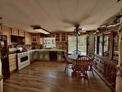 Beautiful Maintained Home on Pristine Land! - image 12