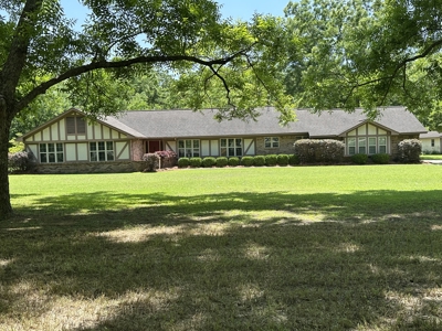 Beautiful Homesite situated on 7.27 acres with mature pecan trees - image 1