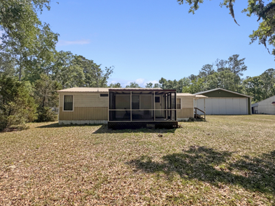 Home & Hangar For Sale in McAlpin, Florida - image 1