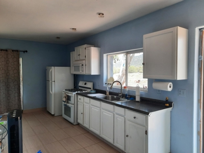 GORGEOUS 36 acre off grid parcel with IMPROVEMENTS!! - image 22