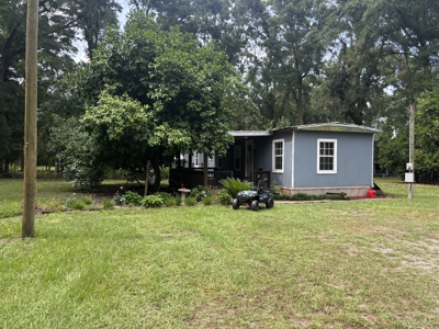 “Live the River Life! 2 Homes on 5 Acres Near Suwannee River!" - image 1