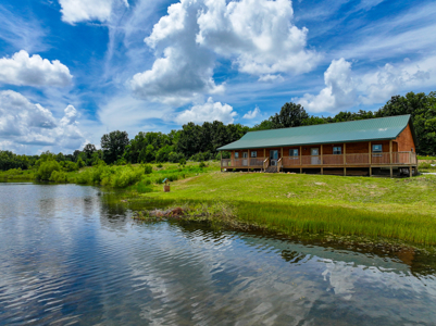 Home on Private Lake for Sale Collins MO - image 1