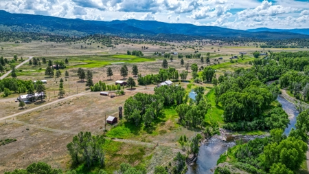 Chama NM Riverfront Acreage and Home, Horse Property - image 1