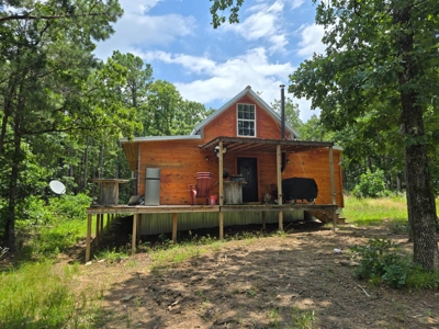 Mountain Cabin with Acreage for Sale in Clayton, Oklahoma - image 1