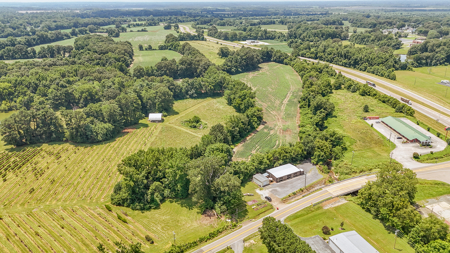 Land for Sale in West TN with Farming & Commercial Opportunities - image 1