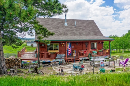 Charming Colorado Log Home with Views For Sale in Teller County - image 1