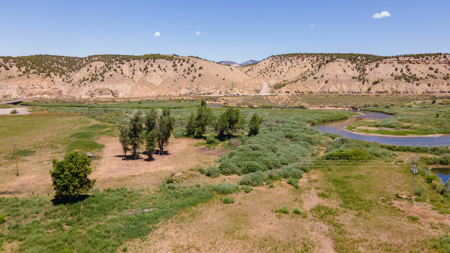 Riverfront Acreage with Water Rights, Gravel Permits, and Shop - image 24