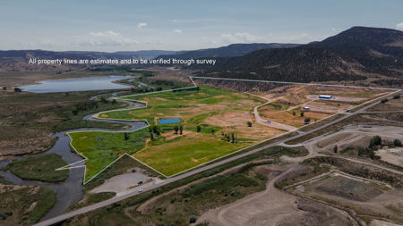 Riverfront Acreage with Water Rights, Gravel Permits, and Shop - image 2