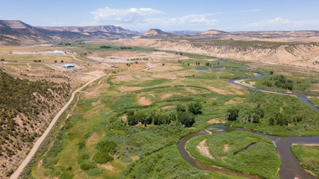 Riverfront Acreage with Water Rights, Gravel Permits, and Shop - image 9