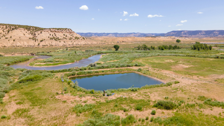 Riverfront Acreage with Water Rights, Gravel Permits, and Shop - image 7