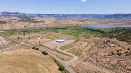 Riverfront Acreage with Water Rights, Gravel Permits, and Shop - image 5