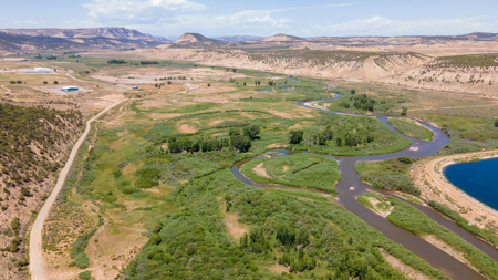 Riverfront Acreage with Water Rights, Gravel Permits, and Shop - image 4