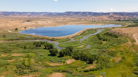 Riverfront Acreage with Water Rights, Gravel Permits, and Shop - image 6