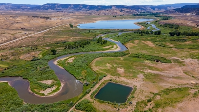 Riverfront Acreage with Water Rights, Gravel Permits, and Shop