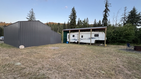 Build-Ready Wooded Acreage with Power, Well & Shop in Orofino, ID - image 4