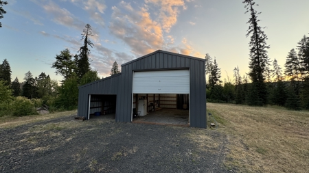 Build-Ready Wooded Acreage with Power, Well & Shop in Orofino, ID - image 1