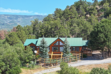 Log Home For Sale on Acreage Bordering BLM in Western Colorado - image 1