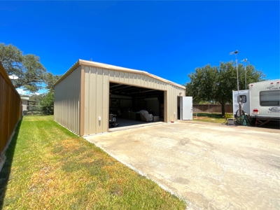 Turnkey Double Lot with 2 RVs, Metal Building & More in Rockport! - image 6
