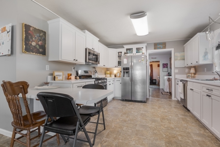 Home on 7 acres with cabin and Buffalo River access - image 11