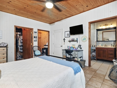Earth-Berm Log Home on 19 Acres with Pond & Springs - image 11