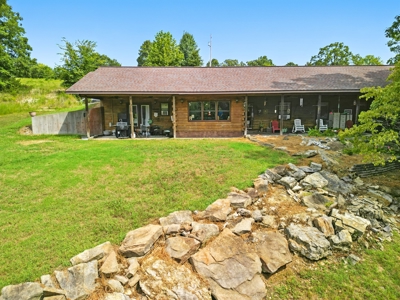 Earth-Berm Log Home on 19 Acres with Pond & Springs - image 24