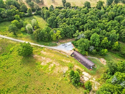 Earth-Berm Log Home on 19 Acres with Pond & Springs - image 2