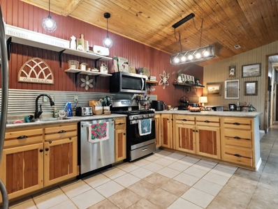 Earth-Berm Log Home on 19 Acres with Pond & Springs - image 8