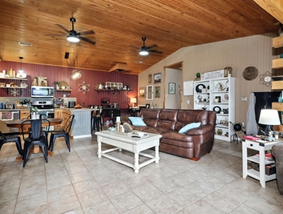 Earth-Berm Log Home on 19 Acres with Pond & Springs - image 3
