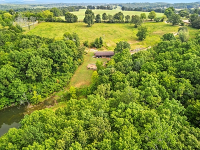 Earth-Berm Log Home on 19 Acres with Pond & Springs - image 26