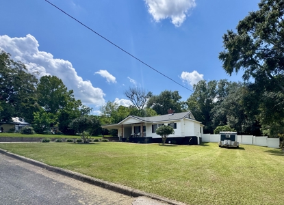 Charming 4-Bedroom home w/ Fenced in Backyard & Warranty - image 2