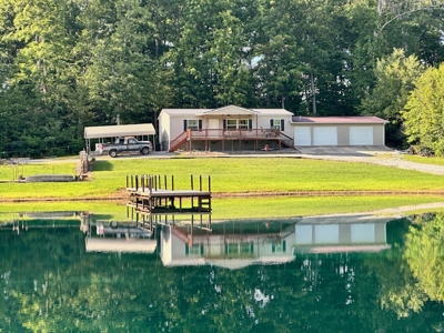 Country home on 3.5 acres with a 1-acre pond. - image 2