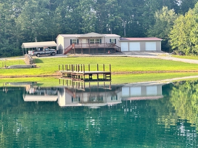 Country home on 3.5 acres with a 1-acre pond. - image 1