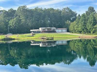 Country home on 3.5 acres with a 1-acre pond. - image 3