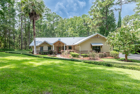 4 Bed 2.5 Bath POOL HOME on 5.31 Acres on Millhopper Rd - image 1
