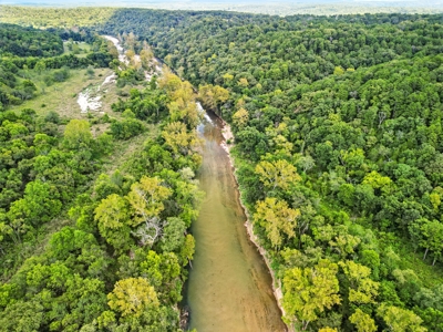 104.5 Acres w/ Bryant Creek Frontage & Custom Shouse - image 29