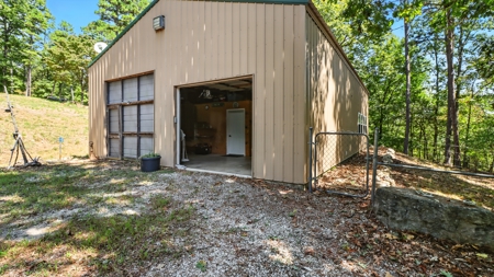 104.5 Acres w/ Bryant Creek Frontage & Custom Shouse - image 36