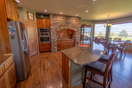 Colorado Custom Home with Acreage and Pond - image 6