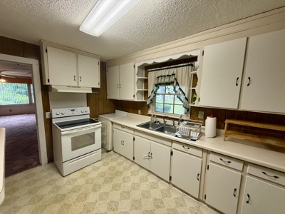4BR/2BA Home in Dothan with Carport, Fenced Yard & Potential - image 10