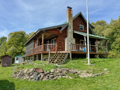 Off-Grid Log Home on 33.4 Acres - image 1