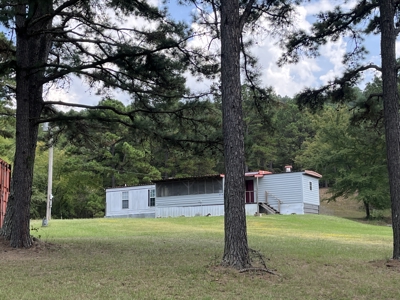 40 Acres with Home, Cabin, Pond & Timber in Southeastern OK - image 23