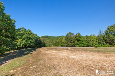 Country home & 64 acres, shop, barn, custom home & guest house - image 22