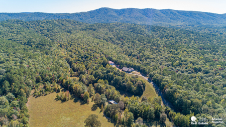 Country home & 64 acres, shop, barn, custom home & guest house - image 47