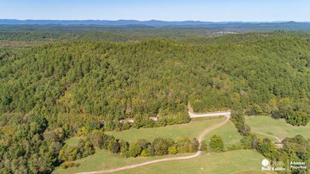 Country home & 64 acres, shop, barn, custom home & guest house - image 46