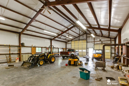 Country home & 64 acres, shop, barn, custom home & guest house - image 33