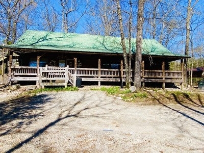 Large Acreage Property With Multiple Cabins For Sale In Ozarks - image 3