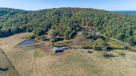 34 Acres with Stunning Mountain Views – Income-Producing Home - image 36