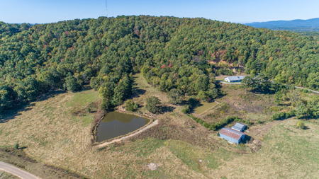 34 Acres with Stunning Mountain Views – Income-Producing Home - image 35