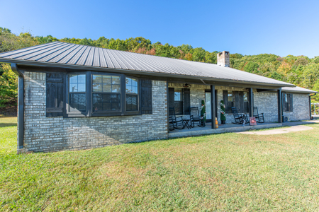 34 Acres with Stunning Mountain Views – Income-Producing Home - image 32