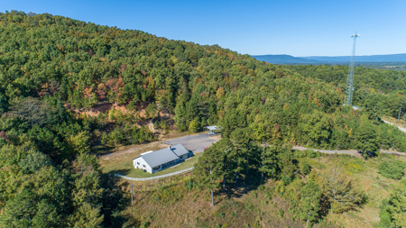 34 Acres with Stunning Mountain Views – Income-Producing Home - image 1